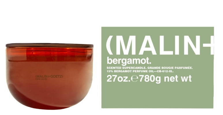 Malin+Goetz Supercandle mit Verpackung in grün